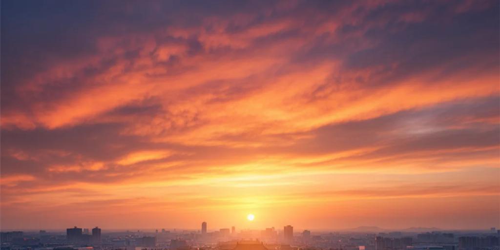 Les toits dorés de la Cité interdite vus du parc Jingshan au coucher du soleil, dans l'axe central de Pékin
